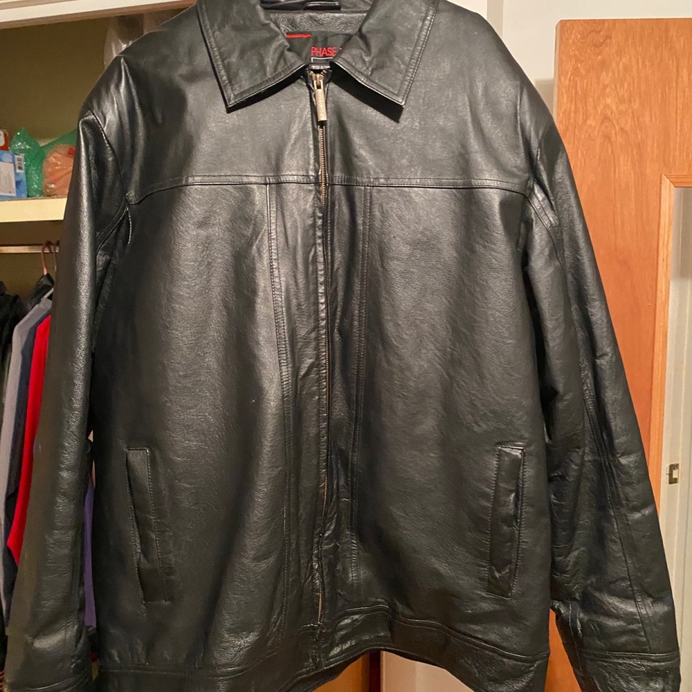 Black leather bomber jacket.   great condition